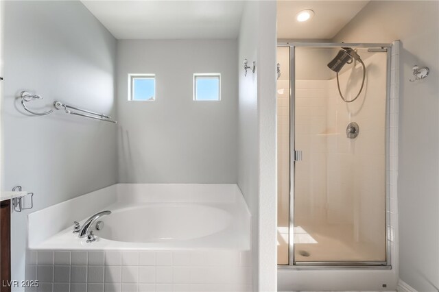 10917 Mount Pendleton St, Las Vegas, NV 89179 - full bath with a stall shower, a bath, and vanity