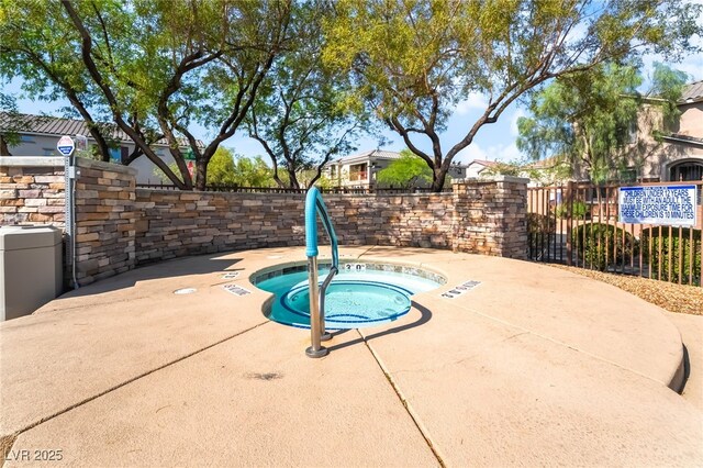 10917 Mount Pendleton St, Las Vegas, NV 89179 - view of pool with a community hot tub and a patio area