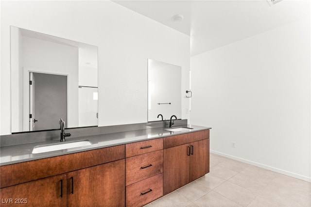 6901 Whisper Canyon Pl, North Las Vegas, NV 89084 - full bath featuring double vanity, tile patterned floors, and baseboards