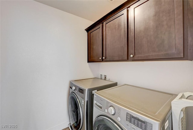 7372 S Palo Real Ct, Las Vegas, NV 89179 - laundry area featuring cabinet space and washer and dryer