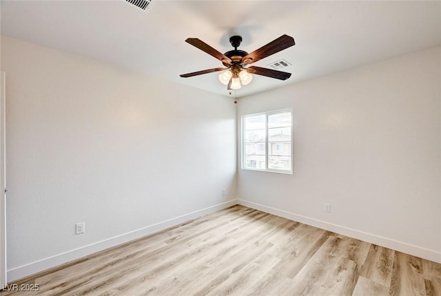 7372 S Palo Real Ct, Las Vegas, NV 89179 - empty room with light wood-type flooring and ceiling fan