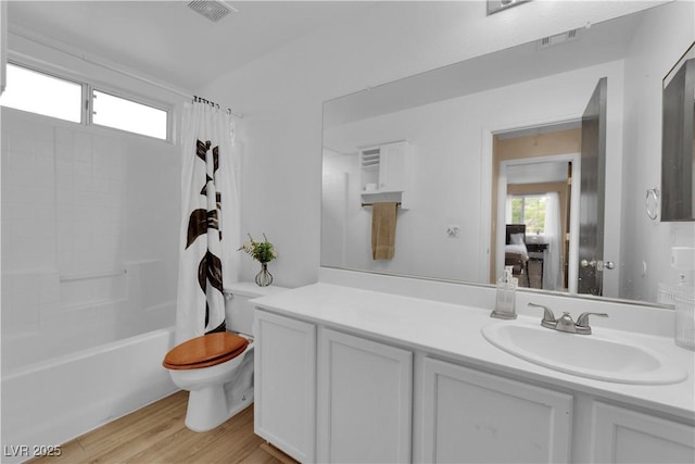 6108 Shallow Springs St, Las Vegas, NV 89130 - ensuite bathroom with toilet, vanity, shower / tub combo, and wood finished floors