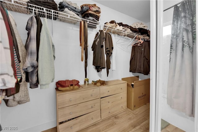 6108 Shallow Springs St, Las Vegas, NV 89130 - walk in closet featuring wood finished floors