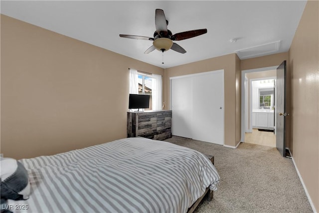 6108 Shallow Springs St, Las Vegas, NV 89130 - carpeted bedroom featuring multiple windows, attic access, a closet, and ceiling fan