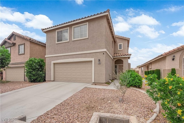 6108 Shallow Springs St, Las Vegas, NV 89130 - view of front of home with a garage, a tiled roof, concrete driveway, and stucco siding