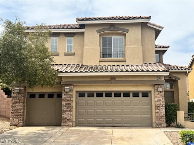 10680 Sapphire Vista Ave, Las Vegas, NV 89144 - mediterranean / spanish-style home featuring an attached garage, a tile roof, concrete driveway, and stucco siding