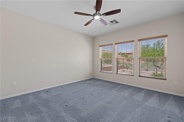 1407 Wheelwright Ct, Mesquite, NV 89034 - spare room with carpet floors, a ceiling fan, and baseboards