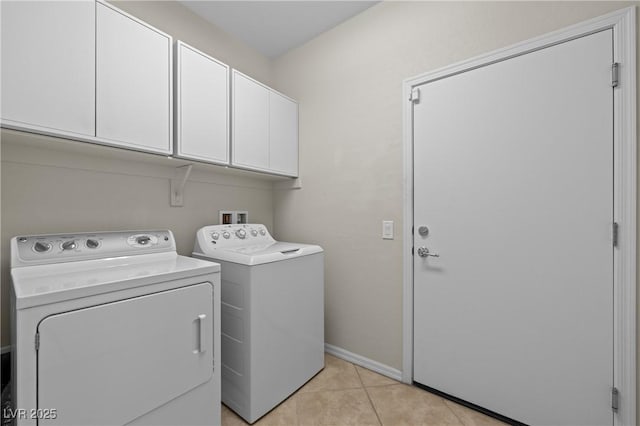 1407 Wheelwright Ct, Mesquite, NV 89034 - laundry area with cabinet space, washing machine and dryer, light tile patterned floors, and baseboards