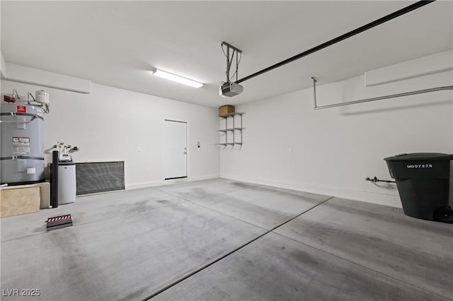 1407 Wheelwright Ct, Mesquite, NV 89034 - garage with a garage door opener, water heater, and baseboards