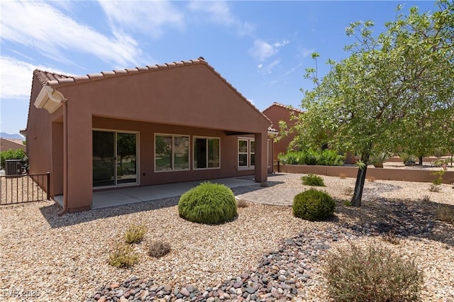 1407 Wheelwright Ct, Mesquite, NV 89034 - rear view of property with a patio and stucco siding