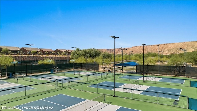 1407 Wheelwright Ct, Mesquite, NV 89034 - view of tennis court featuring community basketball court