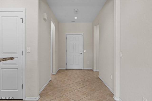 1407 Wheelwright Ct, Mesquite, NV 89034 - hall with light tile patterned floors and baseboards