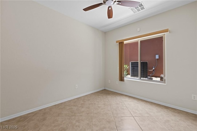 1407 Wheelwright Ct, Mesquite, NV 89034 - spare room featuring ceiling fan, light tile patterned flooring, and baseboards