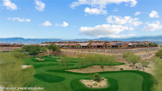 1407 Wheelwright Ct, Mesquite, NV 89034 - view of community with a putting area, view of golf course, and a residential view