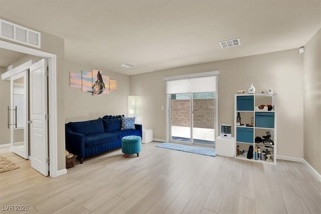 8060 Haywood Estate Ave, Las Vegas, NV 89113 - sitting room with light wood-style floors and baseboards