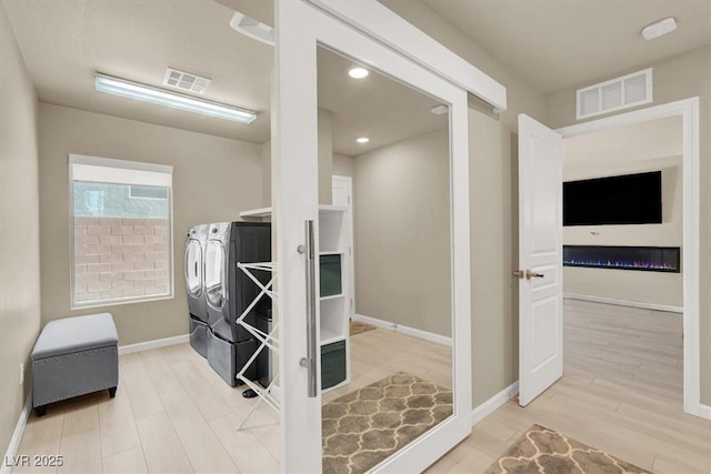 8060 Haywood Estate Ave, Las Vegas, NV 89113 - interior space with separate washer and dryer, wood finished floors, baseboards, and recessed lighting