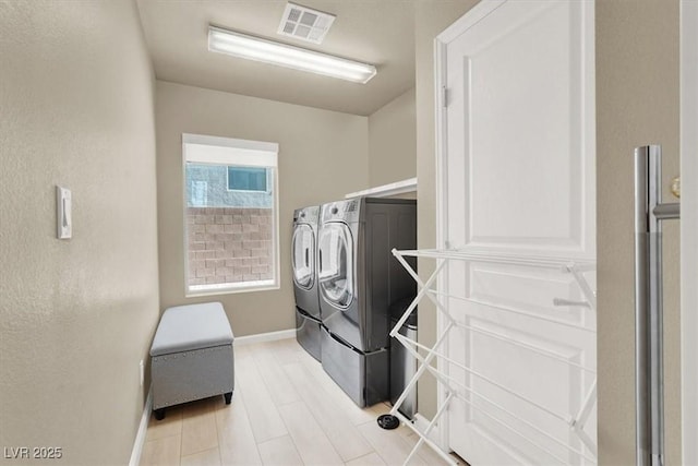 8060 Haywood Estate Ave, Las Vegas, NV 89113 - laundry area featuring washer and clothes dryer and baseboards