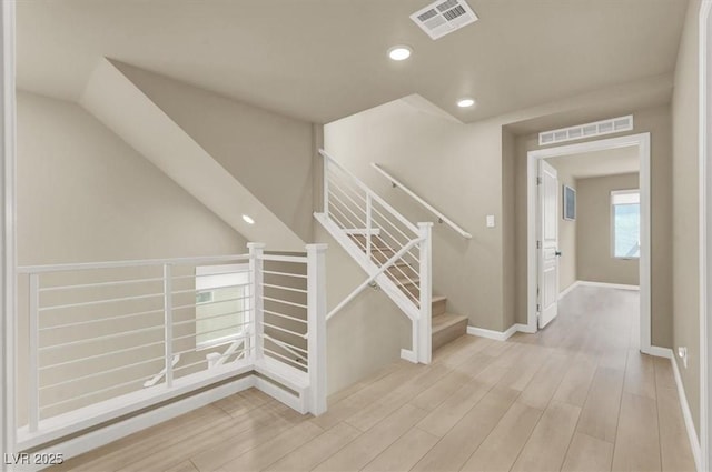 8060 Haywood Estate Ave, Las Vegas, NV 89113 - stairs with wood finished floors, recessed lighting, and baseboards