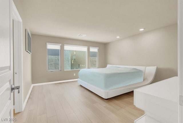 8060 Haywood Estate Ave, Las Vegas, NV 89113 - bedroom with light wood-type flooring, recessed lighting, and baseboards
