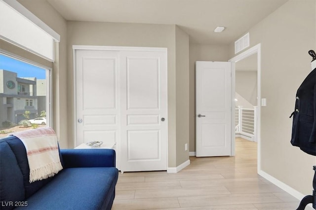 8060 Haywood Estate Ave, Las Vegas, NV 89113 - living area featuring light wood-type flooring and baseboards