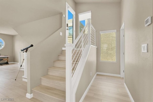 8060 Haywood Estate Ave, Las Vegas, NV 89113 - staircase featuring baseboards and wood finished floors