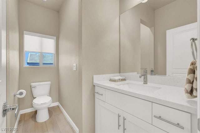 8060 Haywood Estate Ave, Las Vegas, NV 89113 - bathroom featuring vanity, toilet, baseboards, and tile patterned flooring