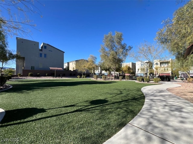 8060 Haywood Estate Ave, Las Vegas, NV 89113 - surrounding community with a yard