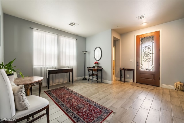 632 Monument Point St, Henderson, NV 89002 - entryway with baseboards and wood finished floors
