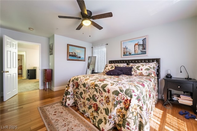 632 Monument Point St, Henderson, NV 89002 - bedroom featuring wood finished floors, ceiling fan, and baseboards