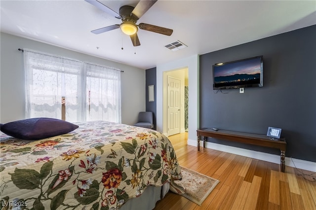 632 Monument Point St, Henderson, NV 89002 - bedroom featuring baseboards, light wood-style floors, and ceiling fan