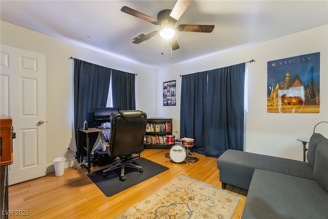 632 Monument Point St, Henderson, NV 89002 - home office with wood finished floors and ceiling fan