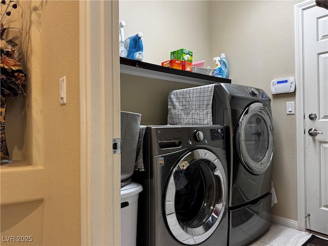 6454 Mount Palomar Ave, Las Vegas, NV 89139 - laundry room featuring washer and dryer, tile patterned flooring, and baseboards