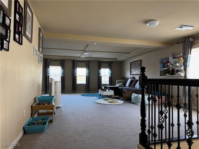 6454 Mount Palomar Ave, Las Vegas, NV 89139 - living room with carpet, beamed ceiling, and baseboards
