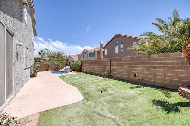 2367 Tilden Way, Henderson, NV 89074 - fenced backyard with a putting area and a patio area
