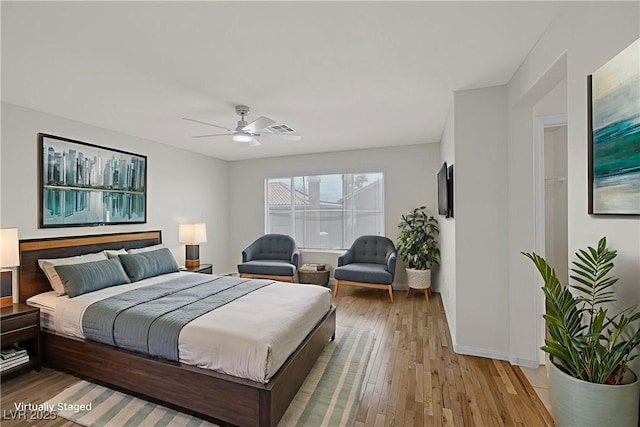 2367 Tilden Way, Henderson, NV 89074 - bedroom with light wood-style flooring, baseboards, and a ceiling fan
