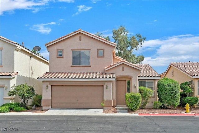 927 Clear Diamond Ave, Las Vegas, NV 89123 - mediterranean / spanish-style house with a tile roof, a garage, stucco siding, and driveway