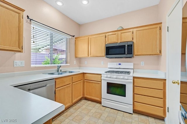 927 Clear Diamond Ave, Las Vegas, NV 89123 - kitchen featuring appliances with stainless steel finishes, a sink, light brown cabinetry, light countertops, and recessed lighting