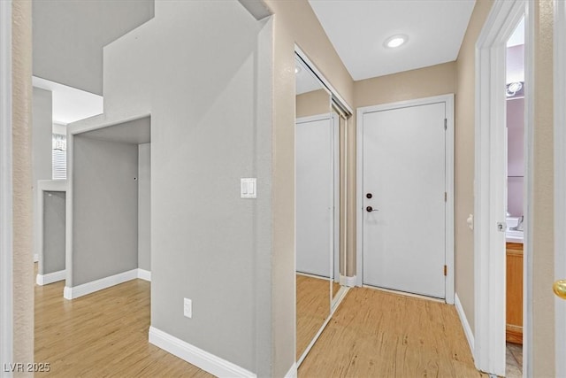 927 Clear Diamond Ave, Las Vegas, NV 89123 - corridor with light wood-type flooring and baseboards