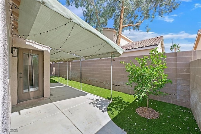 927 Clear Diamond Ave, Las Vegas, NV 89123 - fenced backyard with a patio