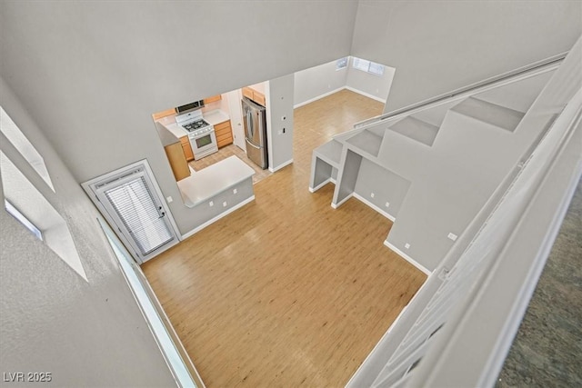 927 Clear Diamond Ave, Las Vegas, NV 89123 - stairway featuring wood finished floors and baseboards