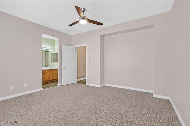 927 Clear Diamond Ave, Las Vegas, NV 89123 - unfurnished bedroom with carpet, baseboards, ensuite bathroom, and a sink