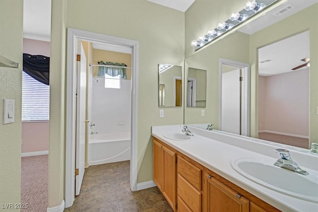 927 Clear Diamond Ave, Las Vegas, NV 89123 - bathroom with double vanity, a tub, and baseboards