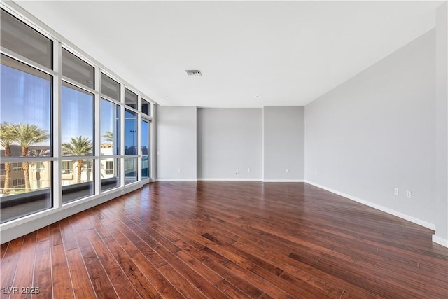 4575 Dean Martin Dr Unit 304, Las Vegas, NV 89103 - unfurnished room with wood finished floors and baseboards