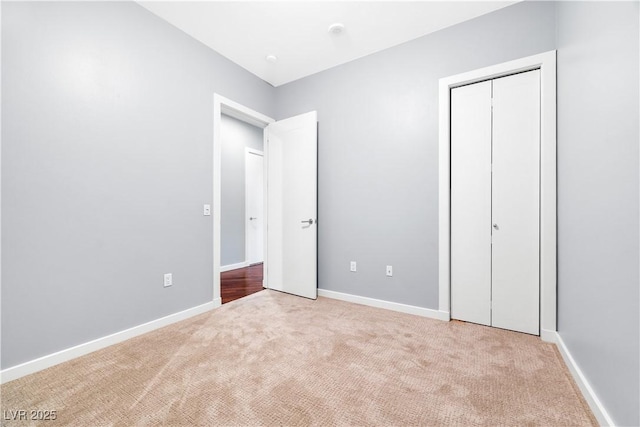 4575 Dean Martin Dr Unit 304, Las Vegas, NV 89103 - unfurnished bedroom featuring carpet, a closet, and baseboards