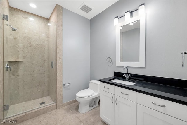 4575 Dean Martin Dr Unit 304, Las Vegas, NV 89103 - full bathroom with toilet, vanity, tile patterned flooring, a shower stall, and baseboards
