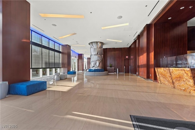 4575 Dean Martin Dr Unit 304, Las Vegas, NV 89103 - common area featuring wooden walls and a wall of windows