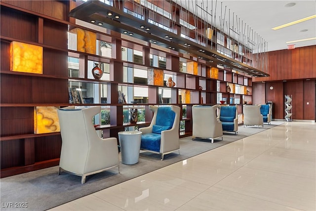 4575 Dean Martin Dr Unit 304, Las Vegas, NV 89103 - community lobby featuring a towering ceiling and wood walls