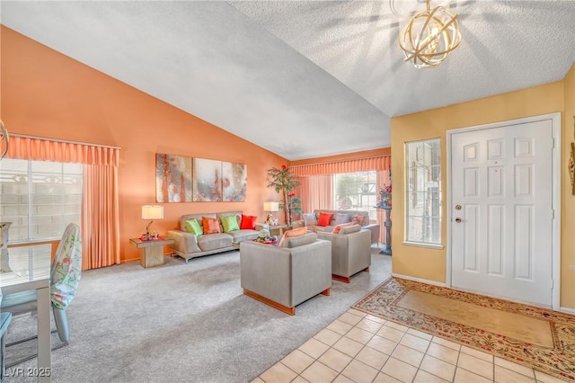 6508 Peppermill Dr, Las Vegas, NV 89146 - tiled living room with vaulted ceiling, carpet flooring, baseboards, and a textured ceiling