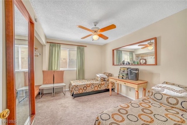 6508 Peppermill Dr, Las Vegas, NV 89146 - carpeted bedroom featuring a textured ceiling, a ceiling fan, and baseboards