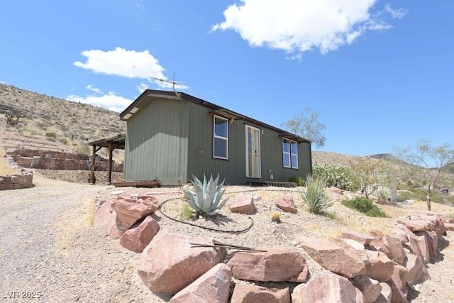 275 Vegas Dr, Goodsprings, NV 89019 - back of house with a mountain view